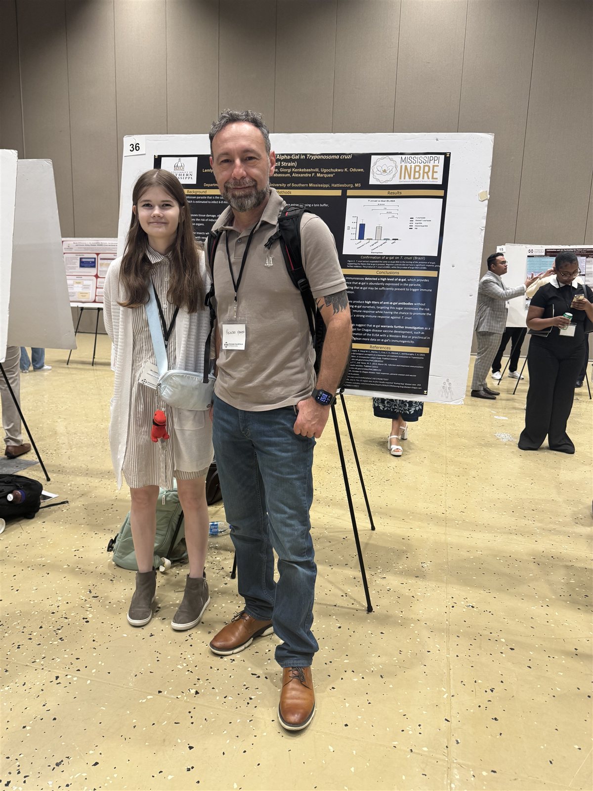 Lemly Bumgarner and Dr. Marques at her poster, Alpha-Gal in Trypanosoma cruzi Brazil Strain