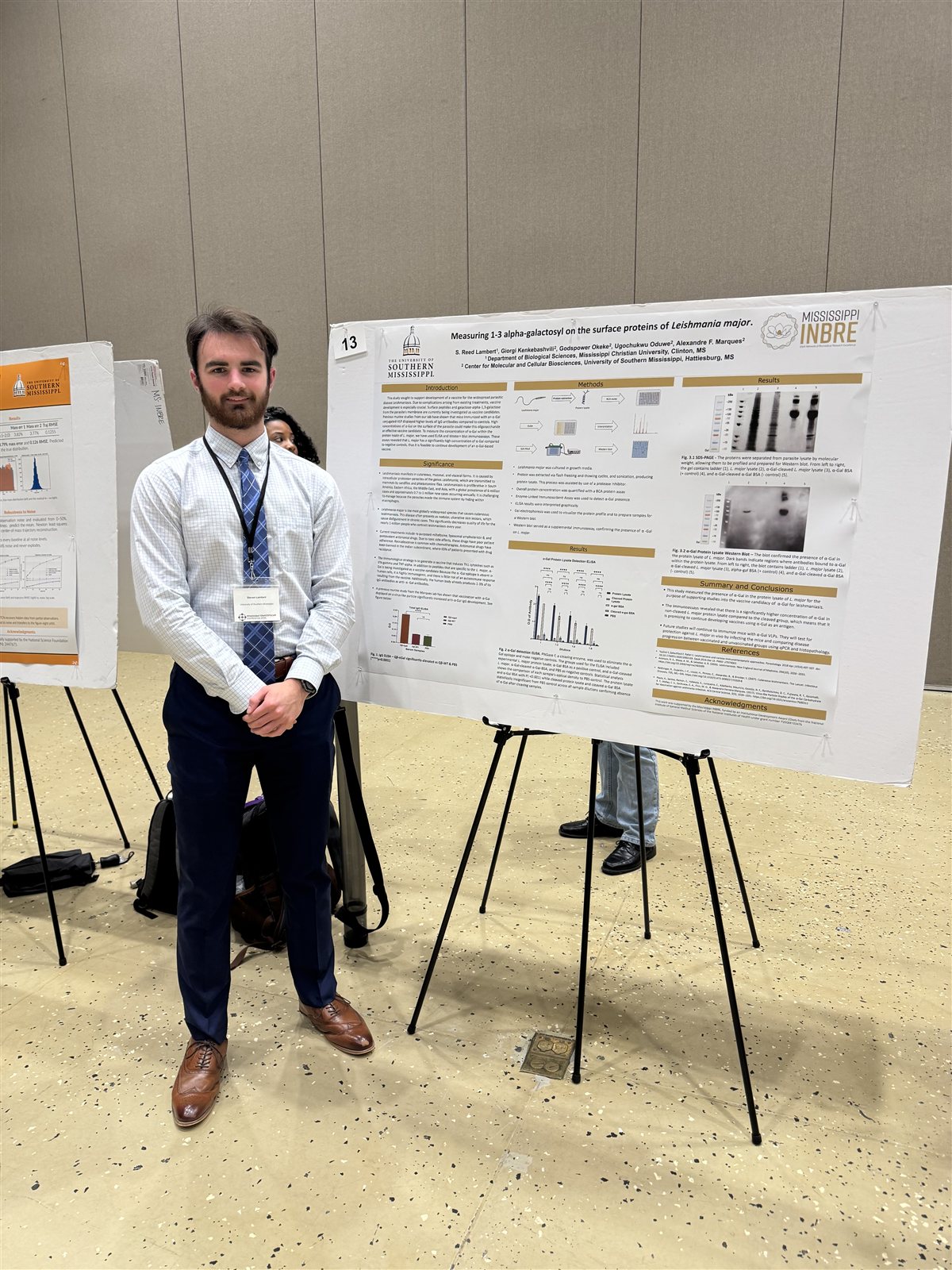Reed Lambert presenting his poster, Measuring 1-3 alpha-galactosyl on the surface proteins of Leishmania major